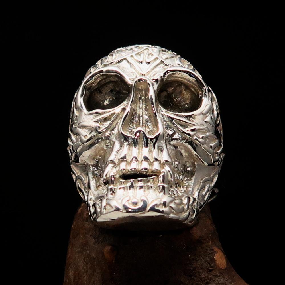 Men's Celtic Skull Ring in sterling silver with a mirror polish finish, showcasing intricate design and quality craftsmanship.