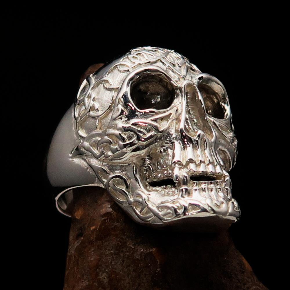 Men's Celtic Skull Ring in sterling silver with a mirror polish finish, showcasing intricate design and quality craftsmanship.