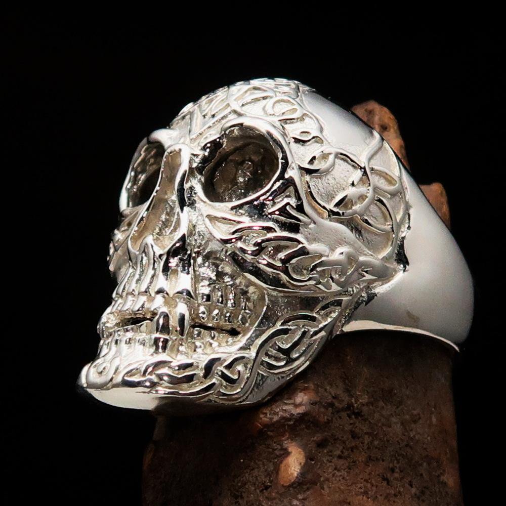 Men's Celtic Skull Ring in sterling silver with a mirror polish finish, showcasing intricate design and quality craftsmanship.