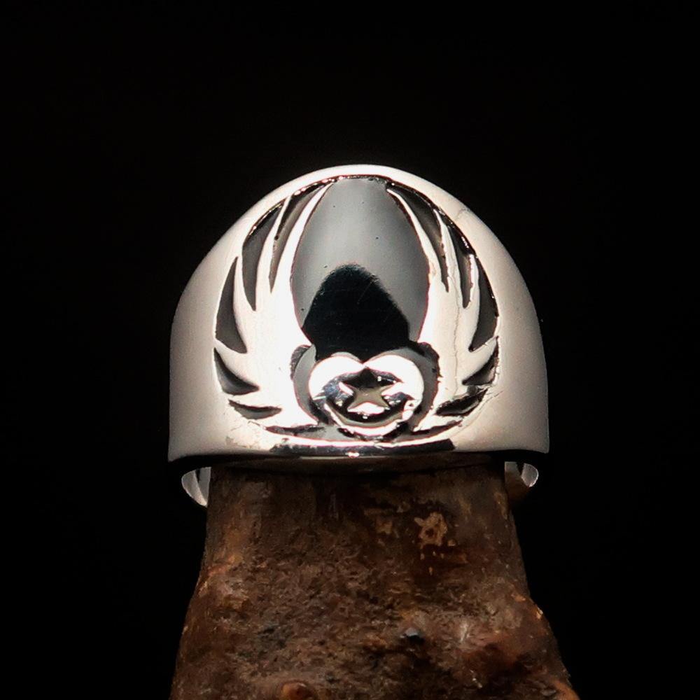 Men's Claddagh Ring featuring a black winged heart design, crafted from solid sterling silver with a high polished finish and enamel accents.