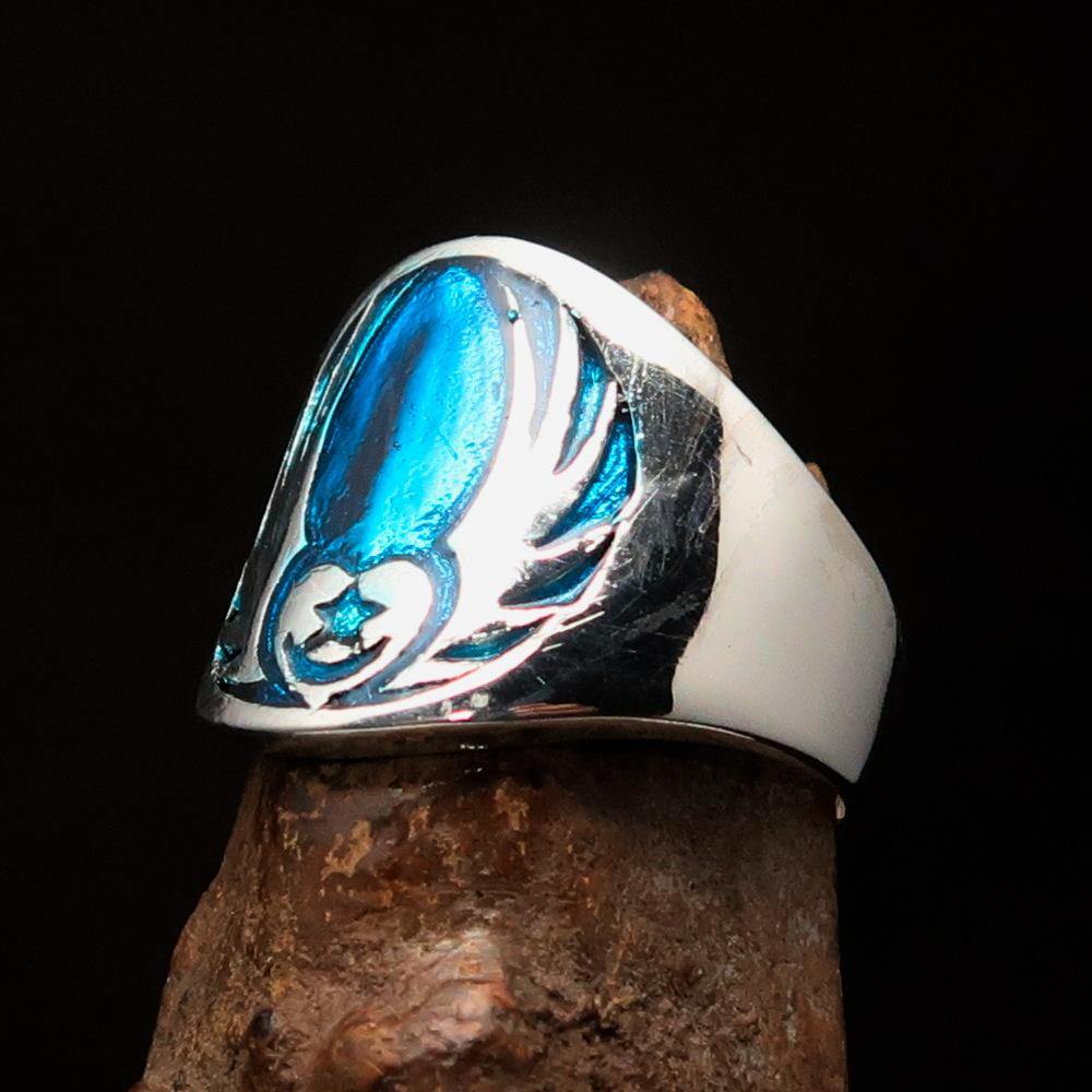 Men's Claddagh Ring in solid sterling silver featuring a blue winged heart design, polished with enamel finish.