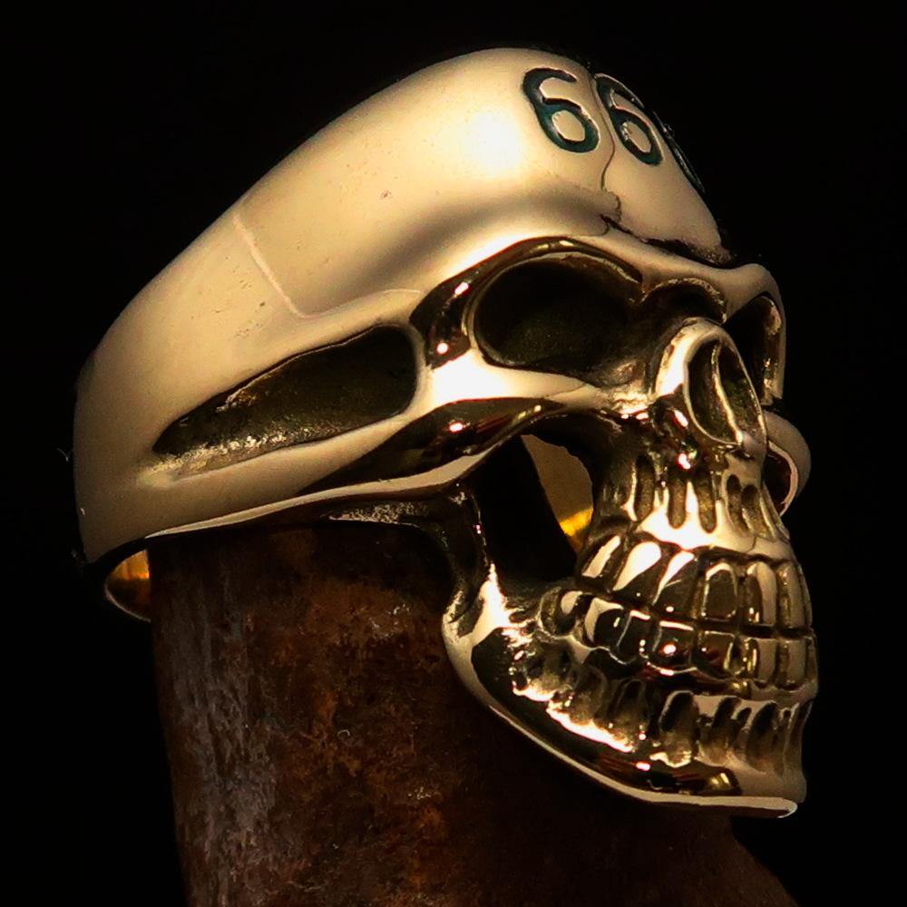 Men's Devil Skull Ring made of solid brass with a high-polished finish and green enamel 666 design on the forehead.