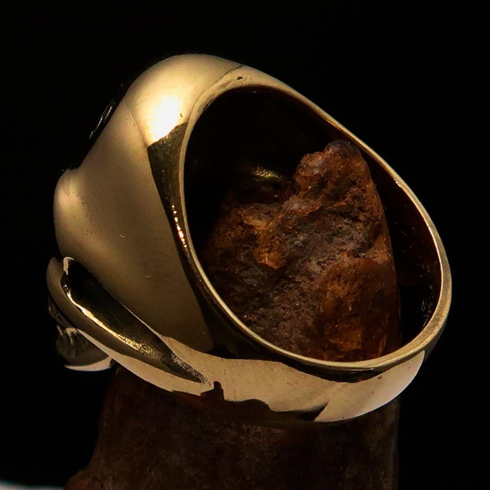 Men's Devil Skull Ring made of solid brass with a high-polished finish and green enamel 666 design on the forehead.