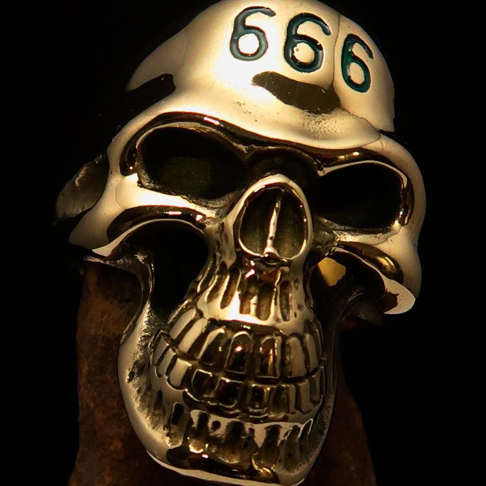 Men's Devil Skull Ring made of solid brass with a high-polished finish and green enamel 666 design on the forehead.