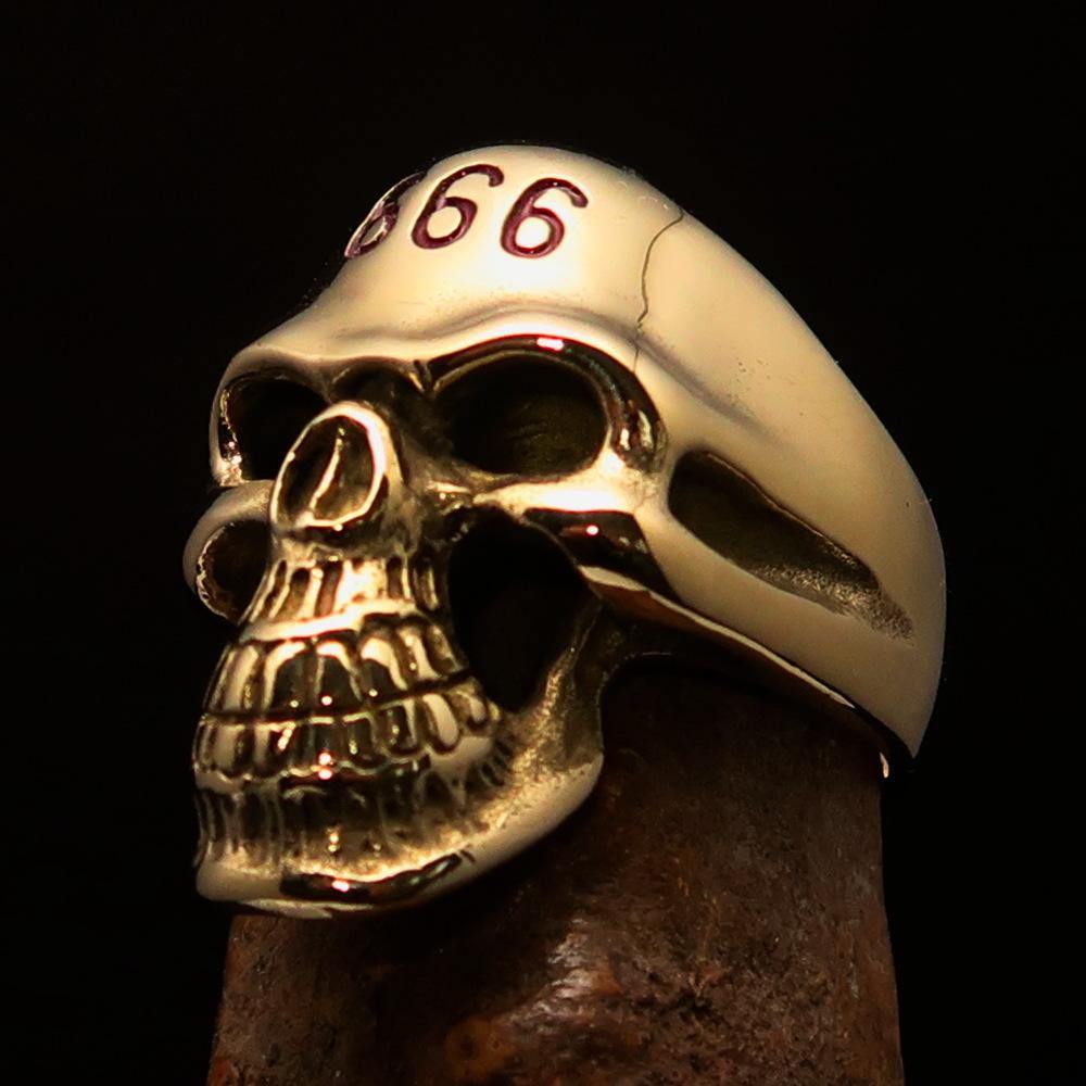 Men's Devil Skull Ring made of solid brass with red enamel 666 design on forehead, showcasing intricate detailing and polished finish.