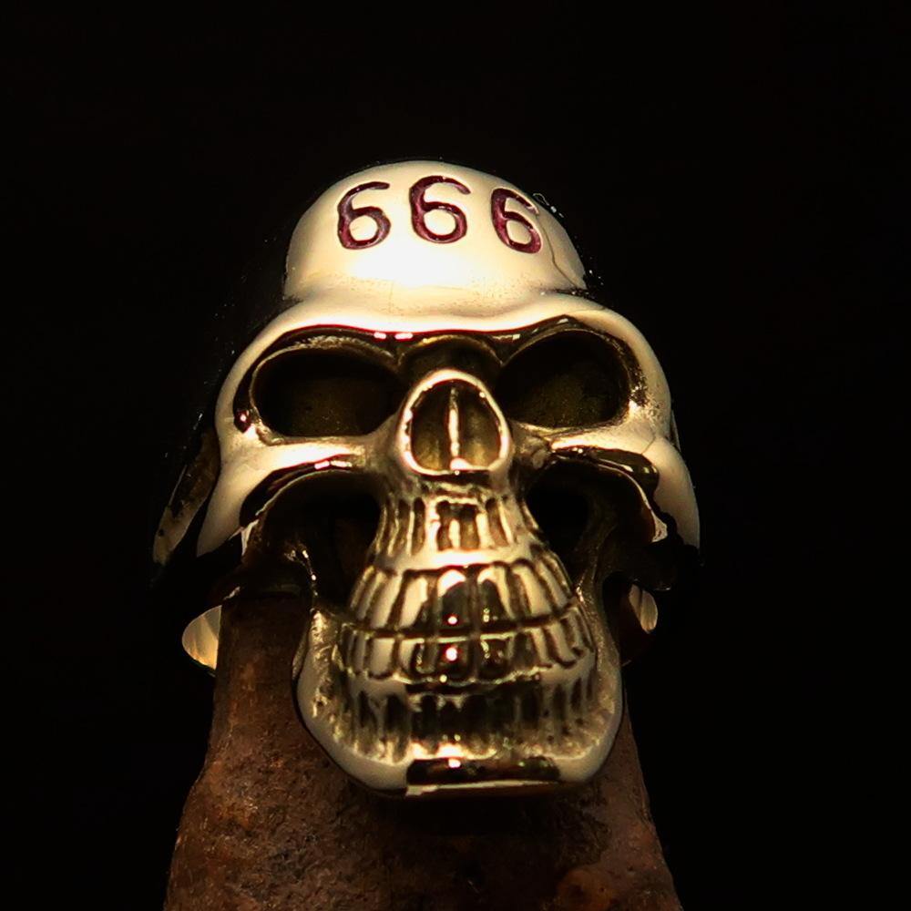 Men's Devil Skull Ring made of solid brass with red enamel 666 design on forehead, showcasing intricate detailing and polished finish.