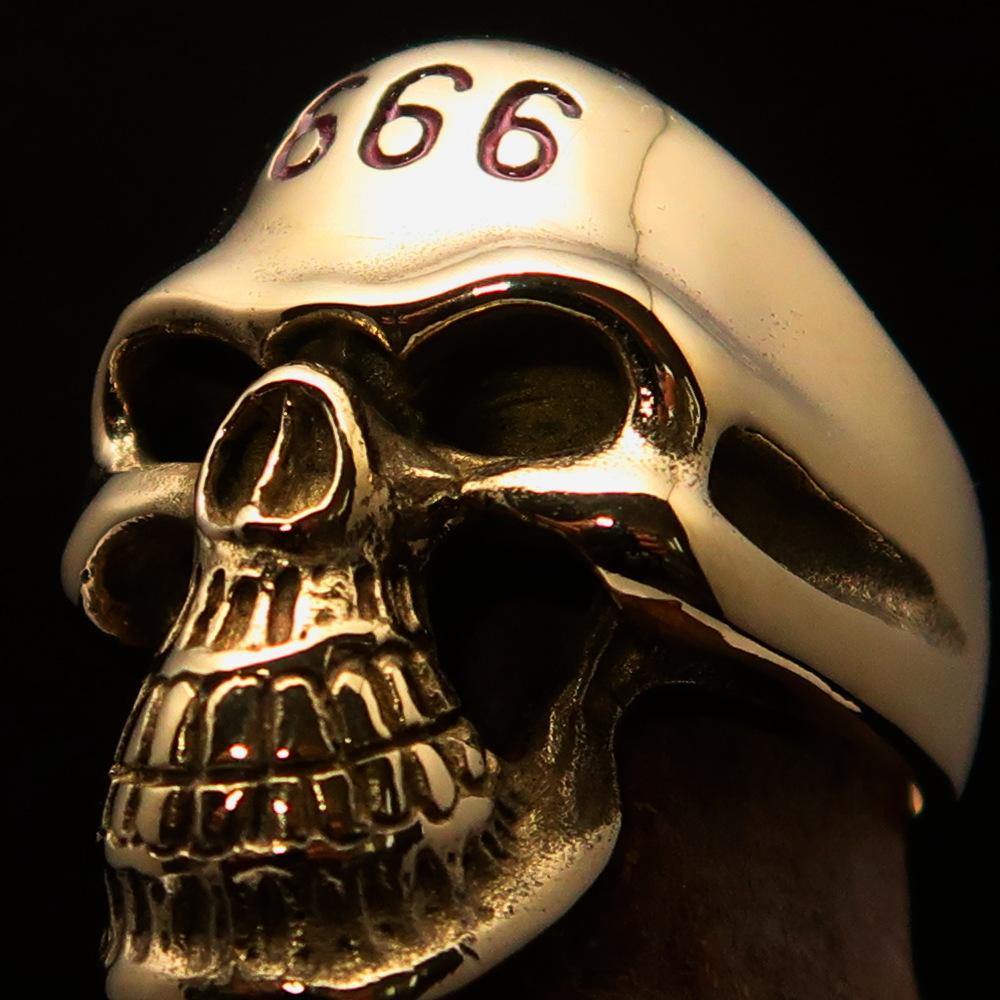 Men's Devil Skull Ring made of solid brass with red enamel 666 design on forehead, showcasing intricate detailing and polished finish.