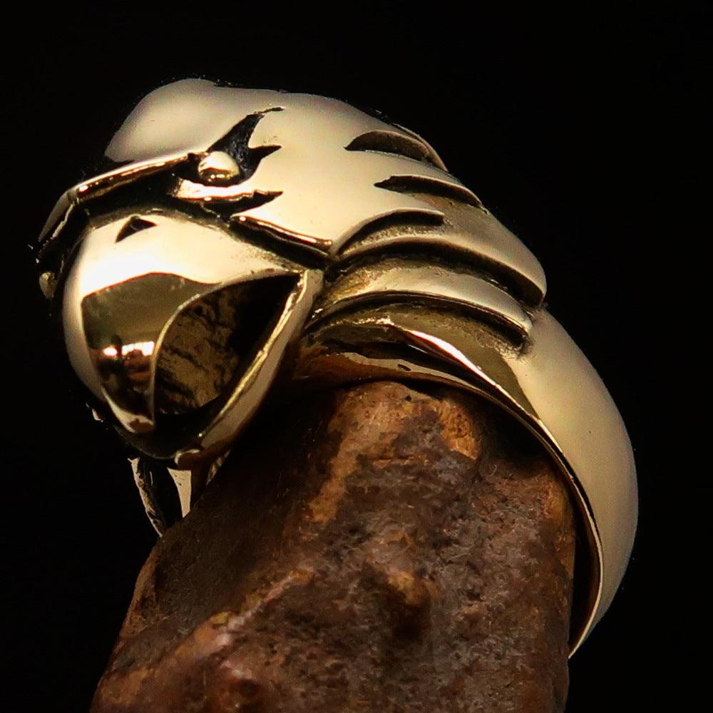 Men's Falcon Hawk Head Ring made of antiqued brass, featuring a detailed falcon head design, showcasing elegance and strength.