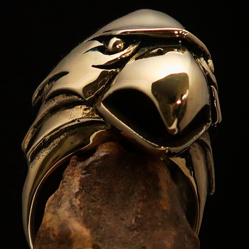 Men's Falcon Hawk Head Ring made of antiqued brass, featuring a detailed falcon head design, showcasing elegance and strength.