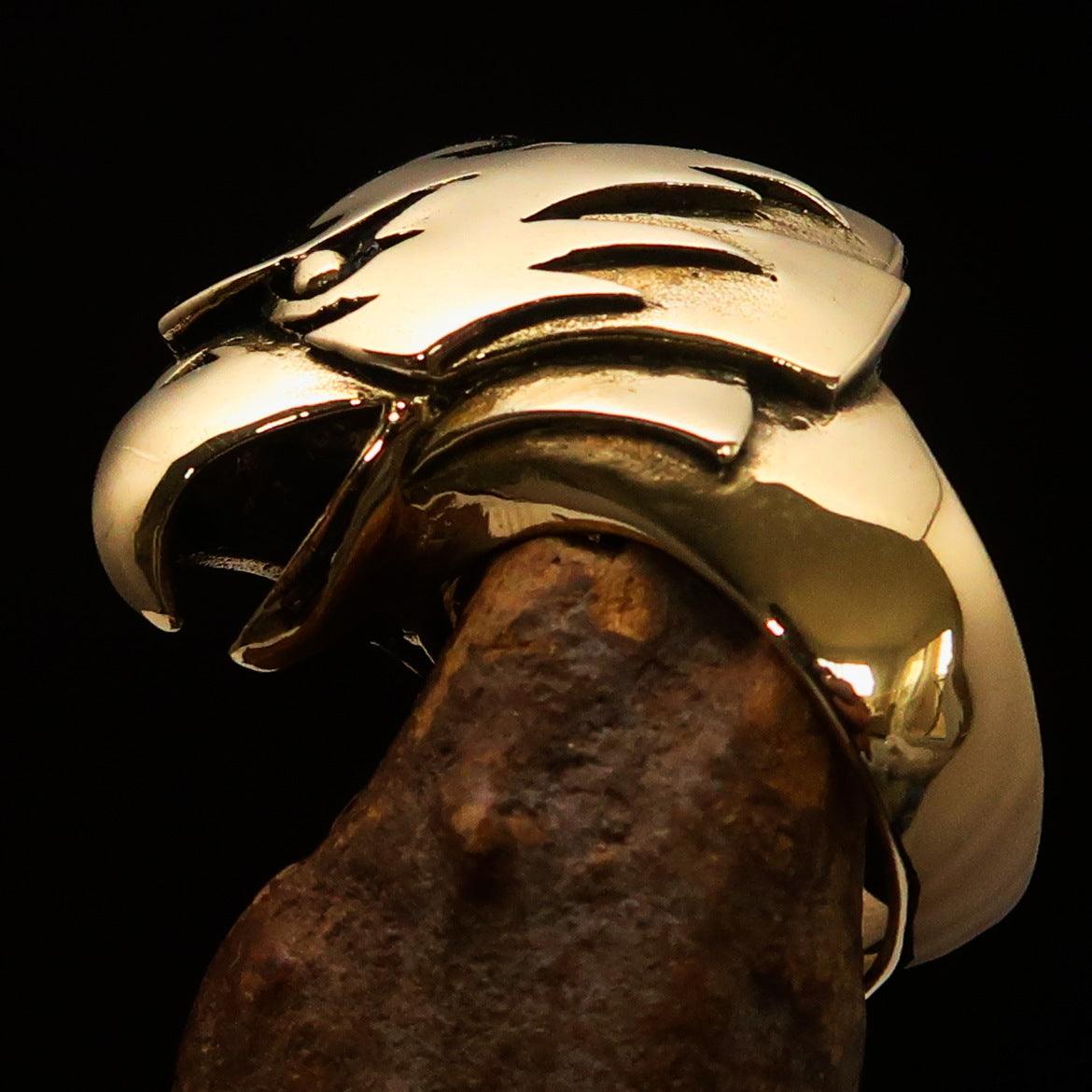 Men's Falcon Hawk Head Ring made of antiqued brass, featuring a detailed falcon head design, showcasing elegance and strength.