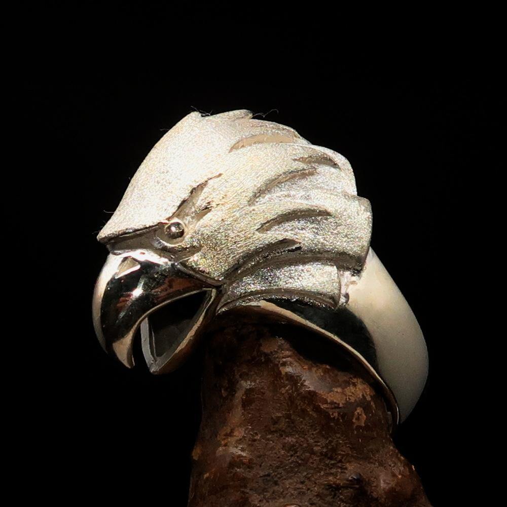 Men's Falcon Head Ring made of sterling silver with a matte finish, showcasing intricate falcon head design and polished details.