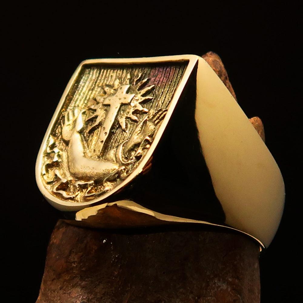 Men's Franciscan Corona Cross Pinky Ring made of solid brass with a shiny mirror-polished finish, showcasing its elegant design.