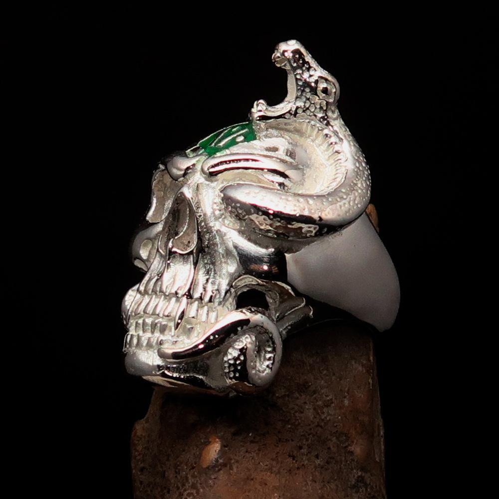 Men's sterling silver outlaw ring featuring a green enamel snake skull design, polished finish, and available in multiple sizes.