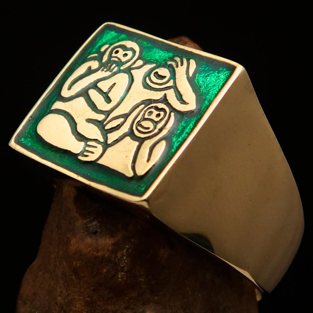 Men's green 3 Monkeys Pinky Ring made of solid brass with vibrant green enamel, featuring intricate monkey designs.