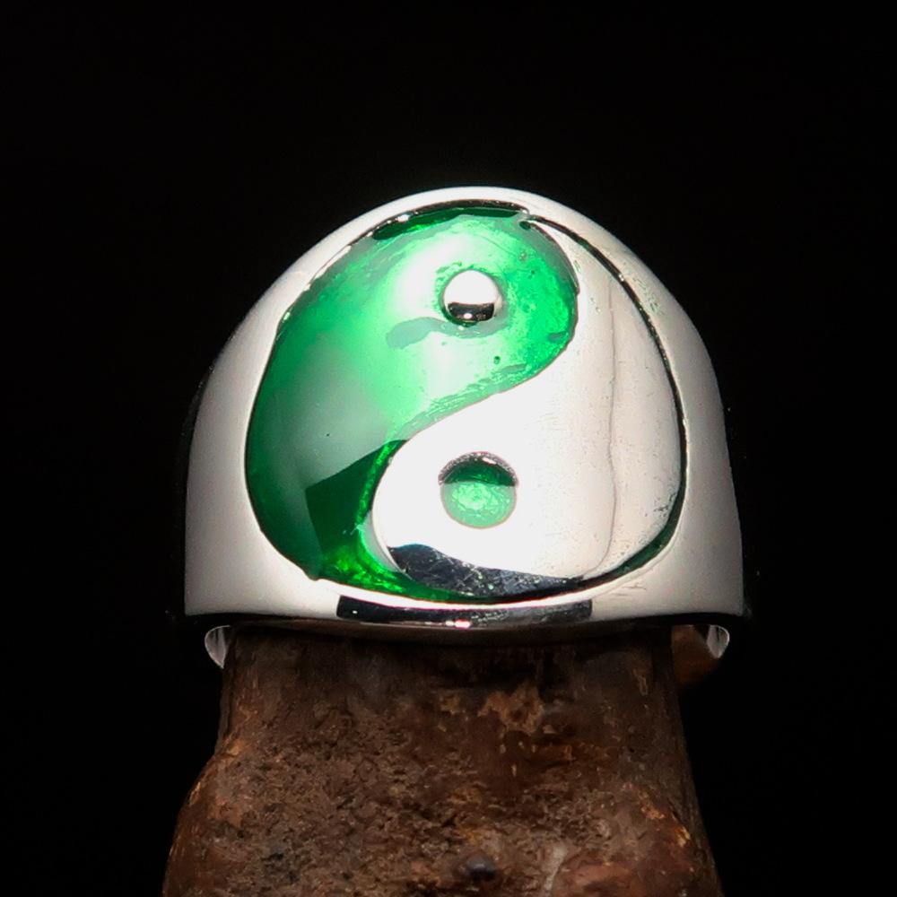 Men's sterling silver Yin Yang ring with green enamel, showcasing a polished finish and intricate design.