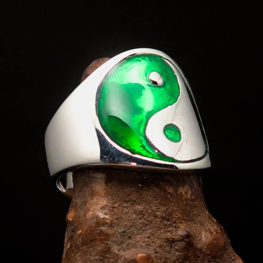 Men's sterling silver Yin Yang ring with green enamel, showcasing a polished finish and intricate design.