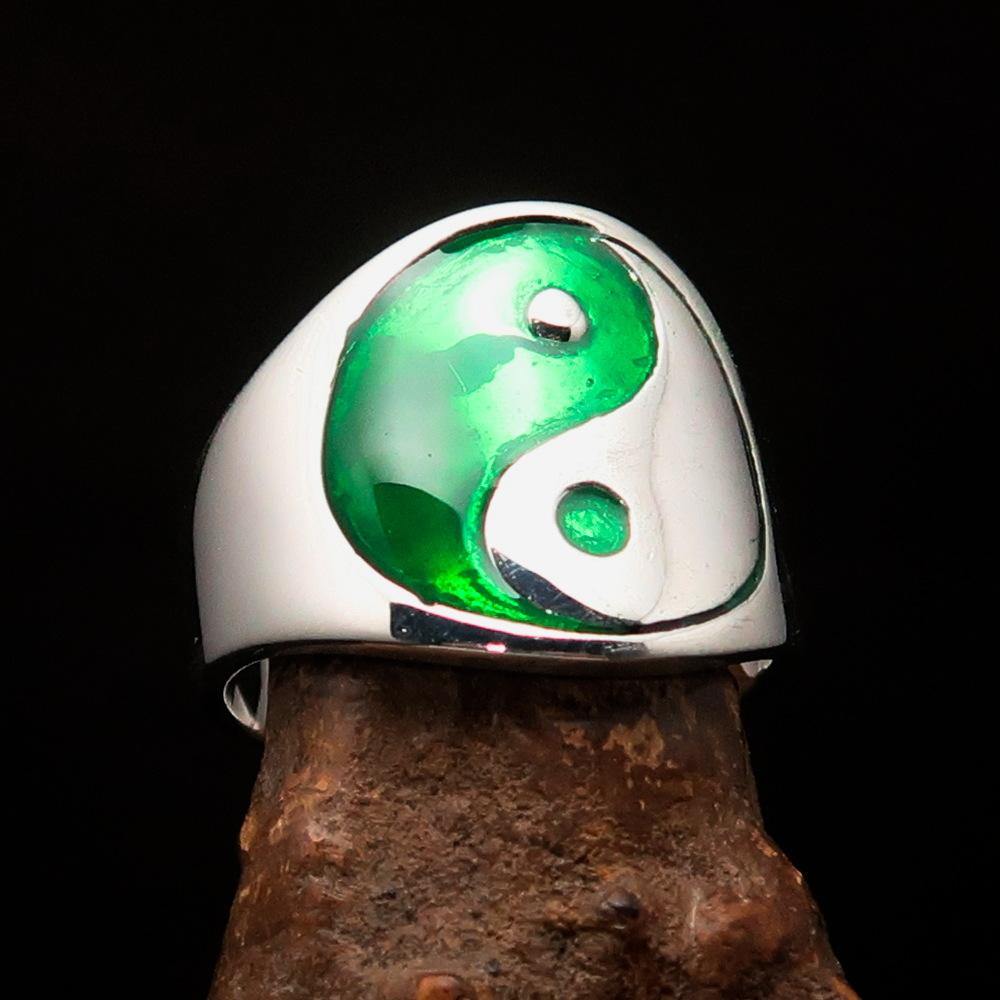 Men's sterling silver Yin Yang ring with green enamel, showcasing a polished finish and intricate design.