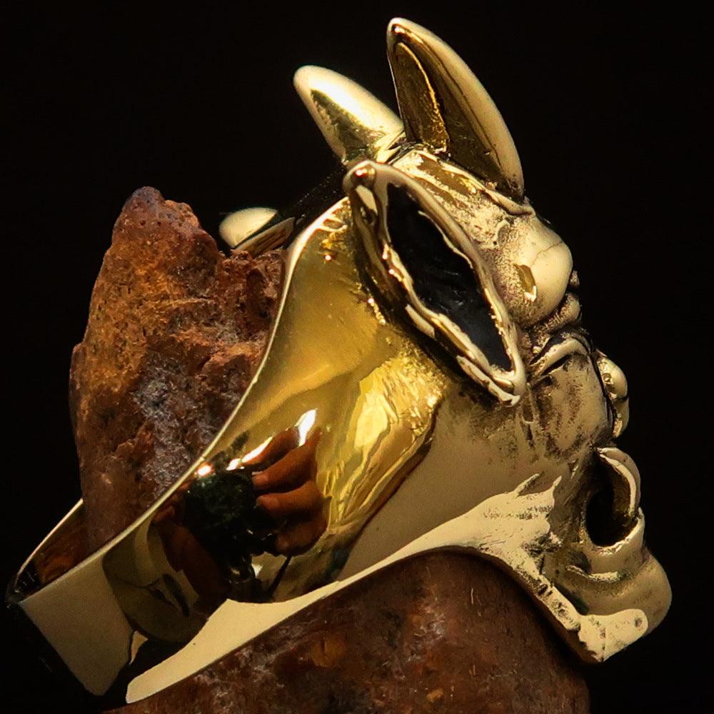 Men's horned Devil Ring made of solid antiqued brass, showcasing intricate details and a polished finish.