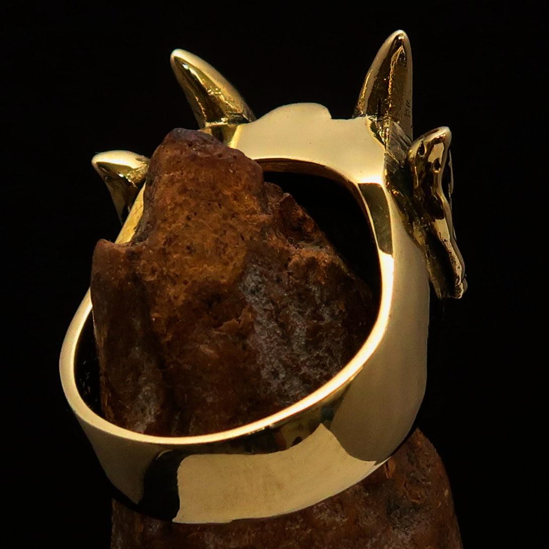 Men's horned Devil Ring made of solid antiqued brass, showcasing intricate details and a polished finish.