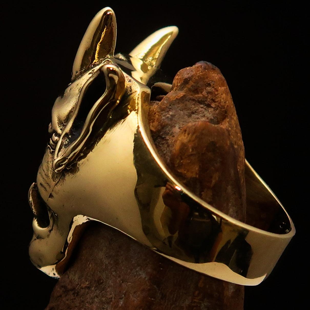 Men's horned Devil Ring made of solid antiqued brass, showcasing intricate details and a polished finish.