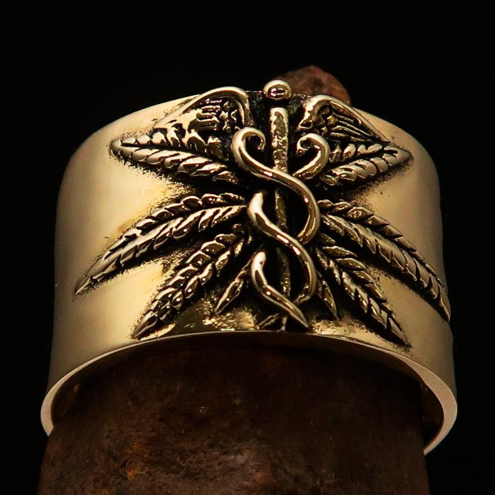 Men's Medical Weed Ring made of solid brass featuring a detailed marihuana leaf design, polished and antiqued for a stylish look.