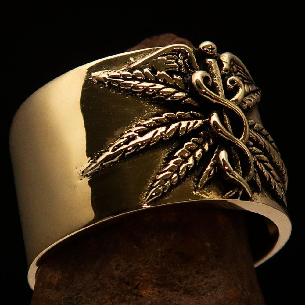 Men's Medical Weed Ring made of solid brass featuring a detailed marihuana leaf design, polished and antiqued for a stylish look.