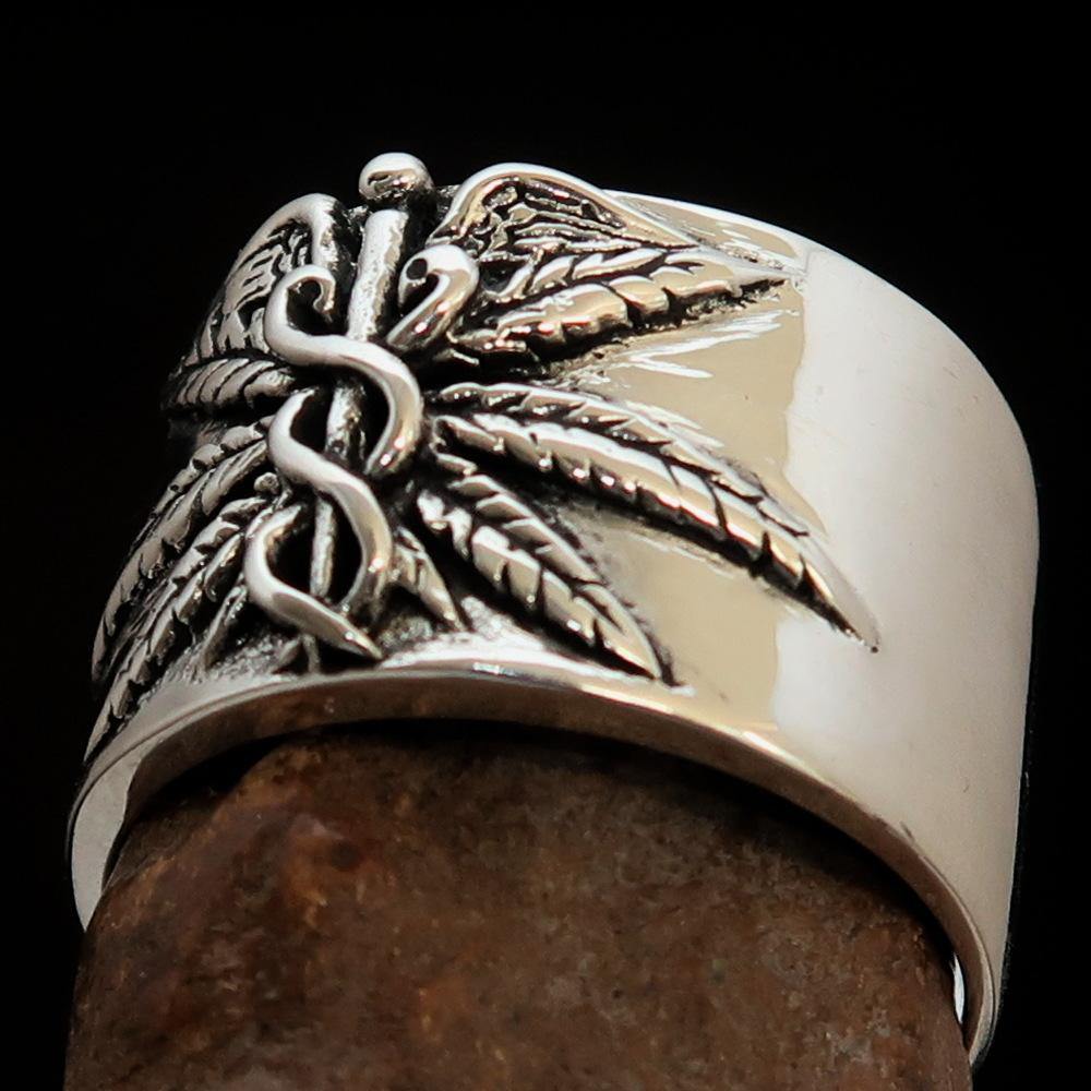 Men's Medical Weed Ring made of solid sterling silver featuring a detailed marijuana leaf design, polished and antiqued finish.