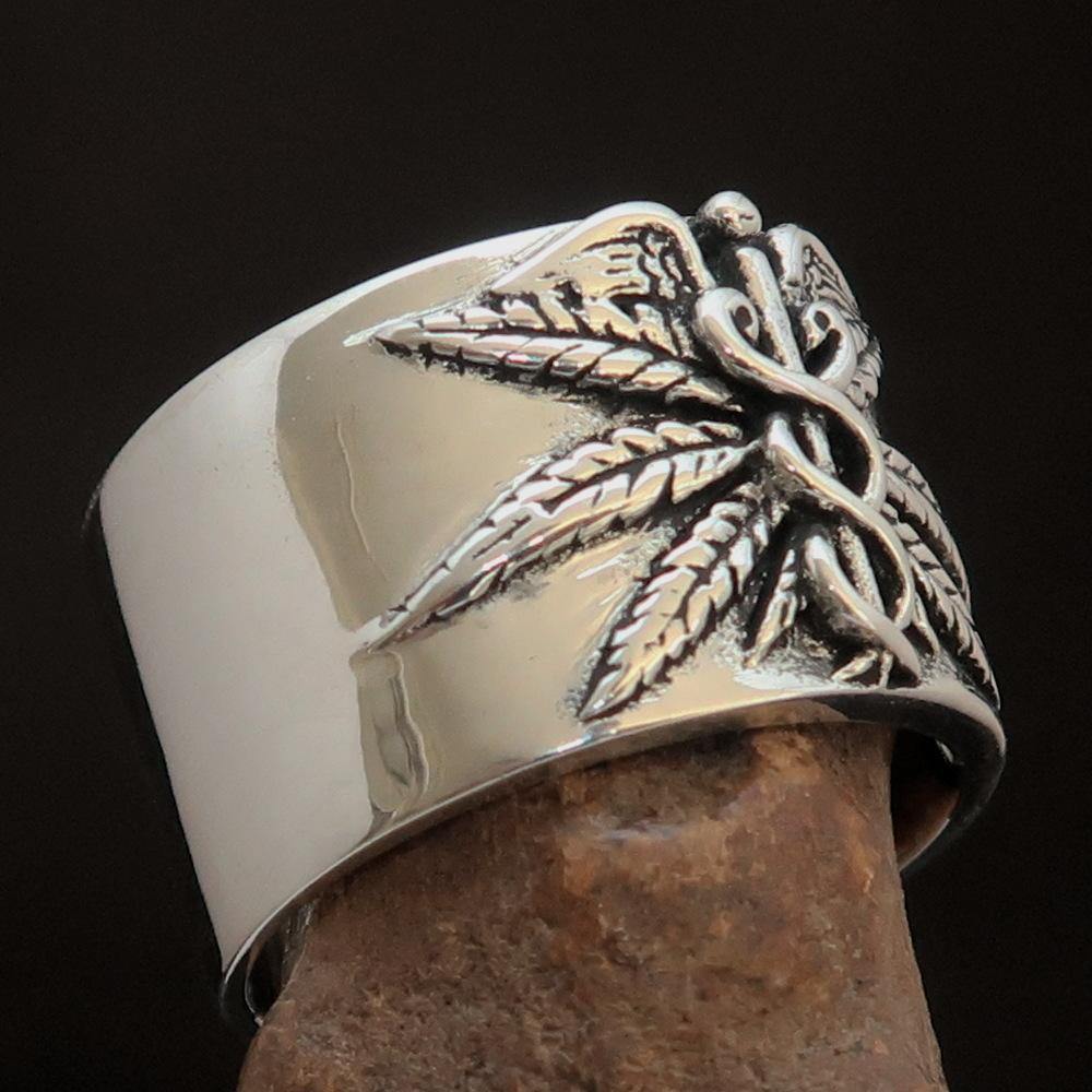 Men's Medical Weed Ring made of solid sterling silver featuring a detailed marijuana leaf design, polished and antiqued finish.