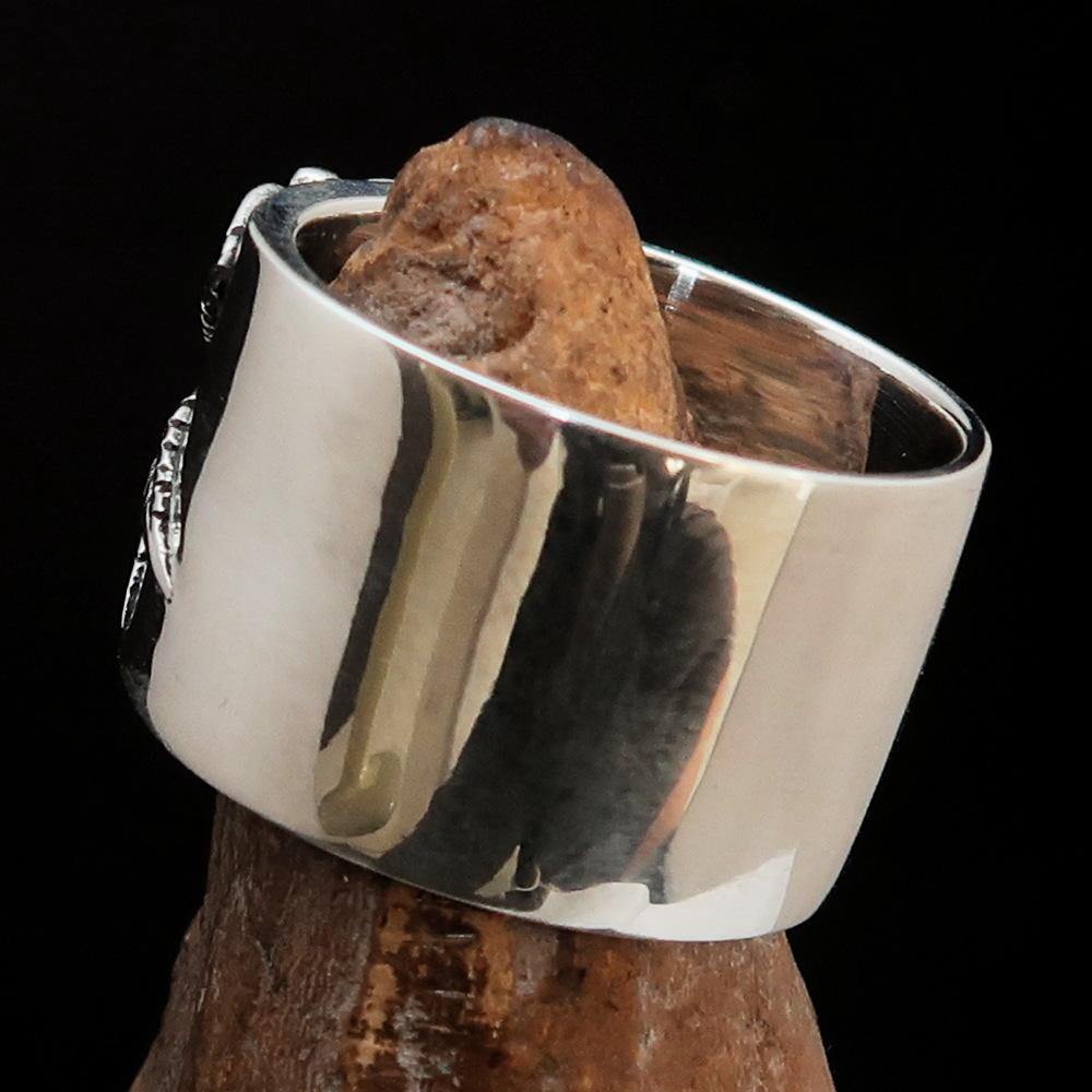 Men's Medical Weed Ring made of solid sterling silver featuring a detailed marijuana leaf design, polished and antiqued finish.