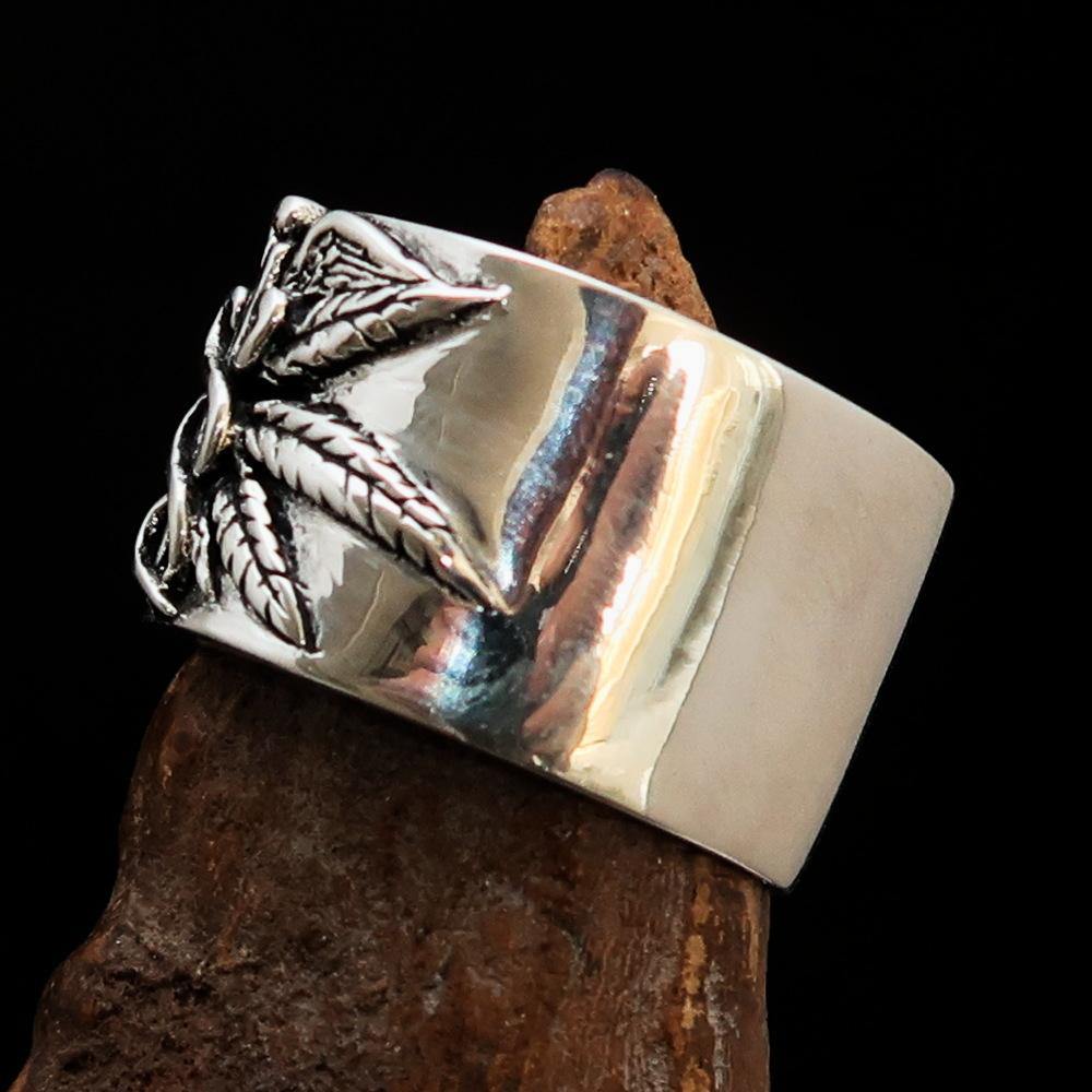 Men's Medical Weed Ring made of solid sterling silver featuring a detailed marijuana leaf design, polished and antiqued finish.