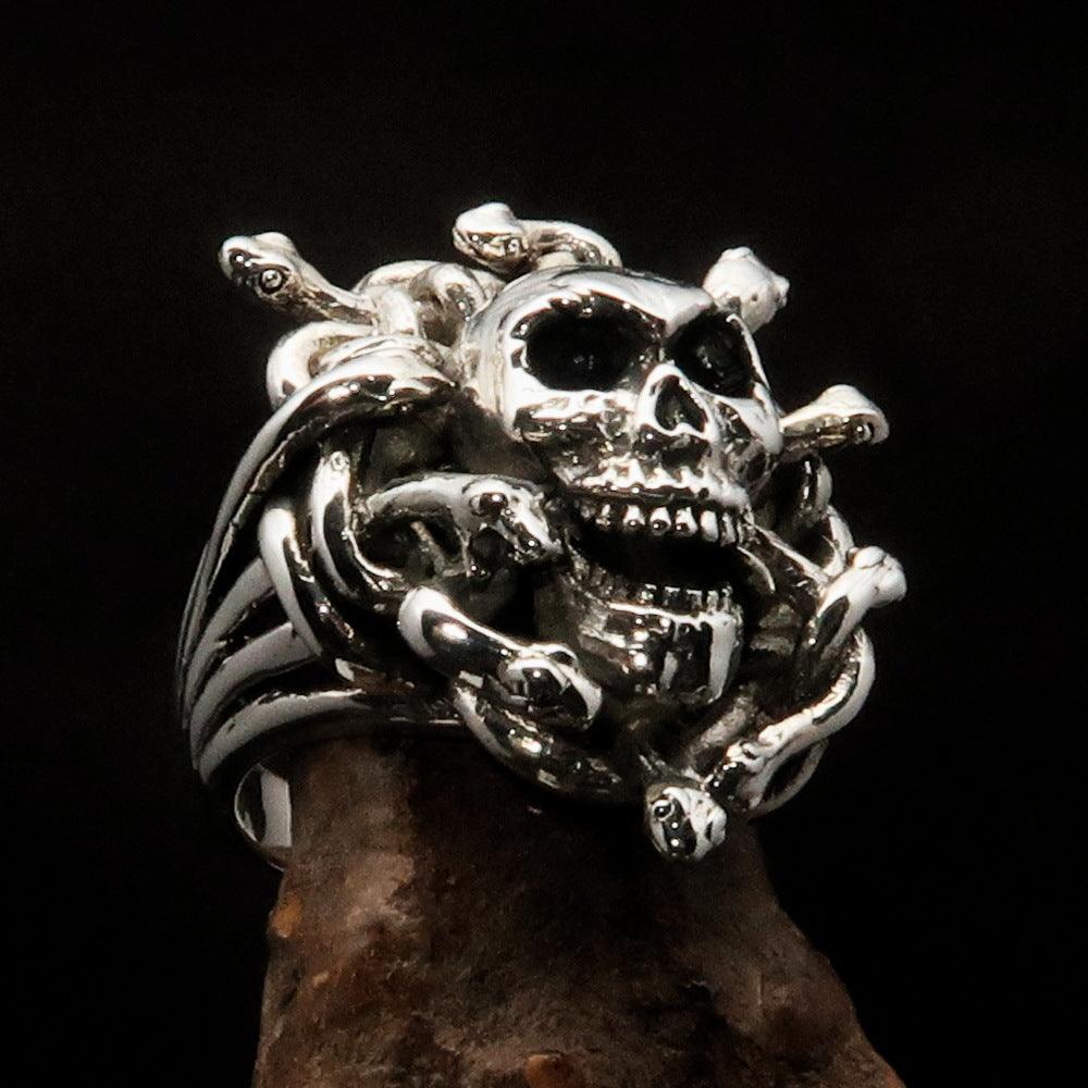 Men's Medusa Head Skull Ring made of antiqued sterling silver, featuring intricate snake designs and a polished finish.