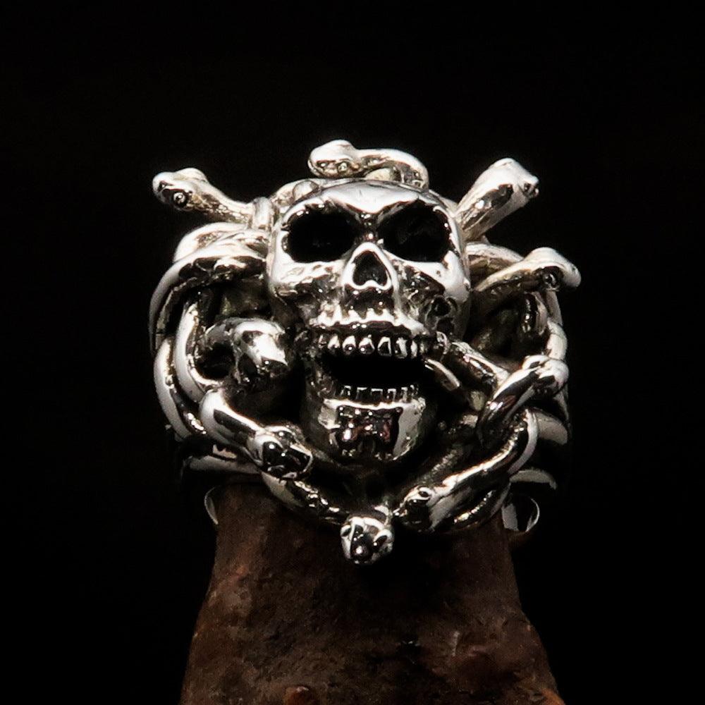 Men's Medusa Head Skull Ring made of antiqued sterling silver, featuring intricate snake designs and a polished finish.