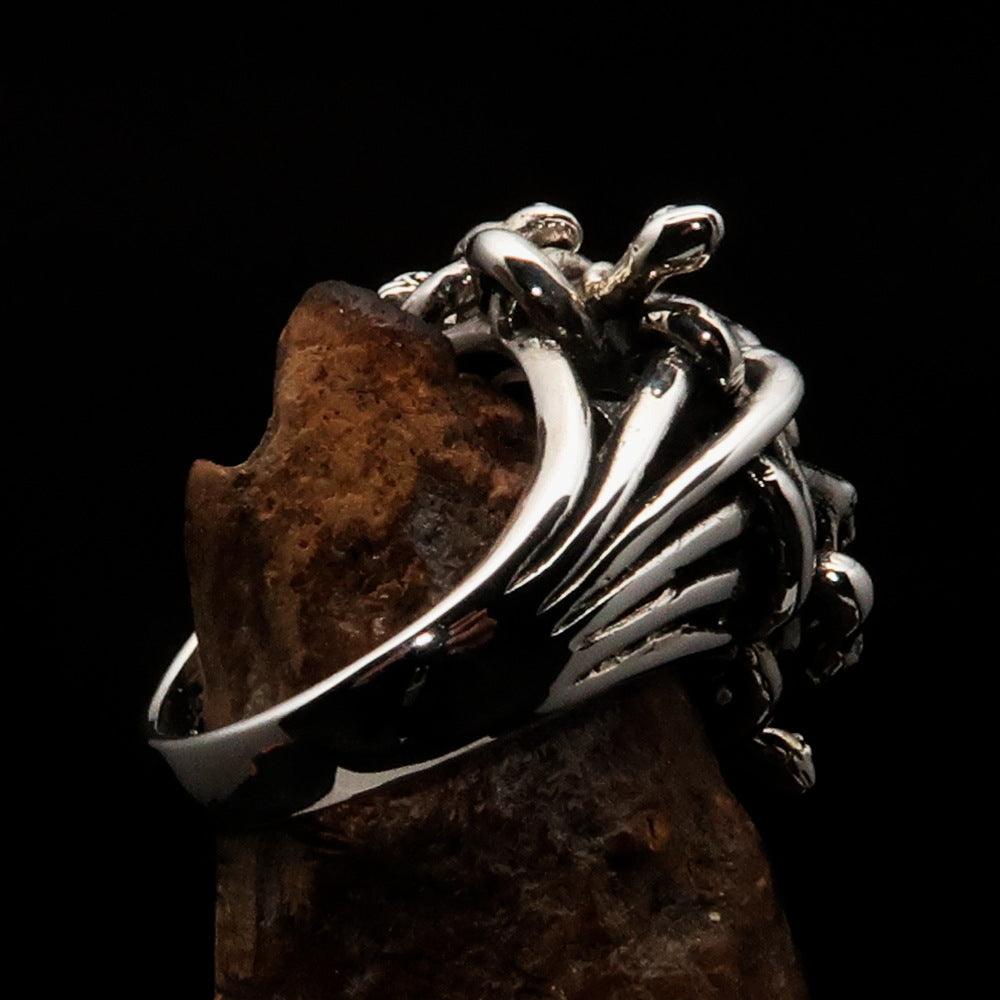 Men's Medusa Head Skull Ring made of antiqued sterling silver, featuring intricate snake designs and a polished finish.