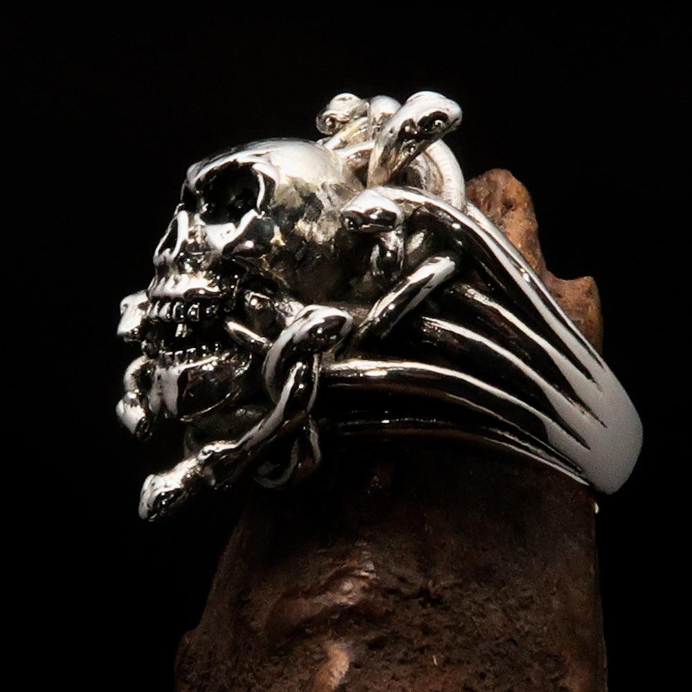 Men's Medusa Head Skull Ring made of antiqued sterling silver, featuring intricate snake designs and a polished finish.