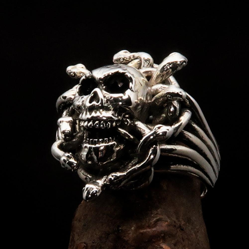 Men's Medusa Head Skull Ring made of antiqued sterling silver, featuring intricate snake designs and a polished finish.