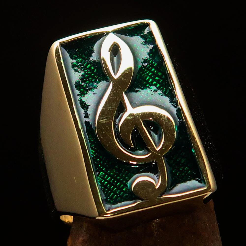 Men's Musician Ring made of solid brass featuring a green Treble Clef symbol, high polished with enamel finish.