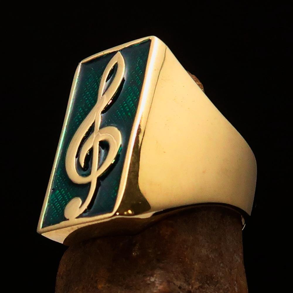 Men's Musician Ring made of solid brass featuring a green Treble Clef symbol, high polished with enamel finish.