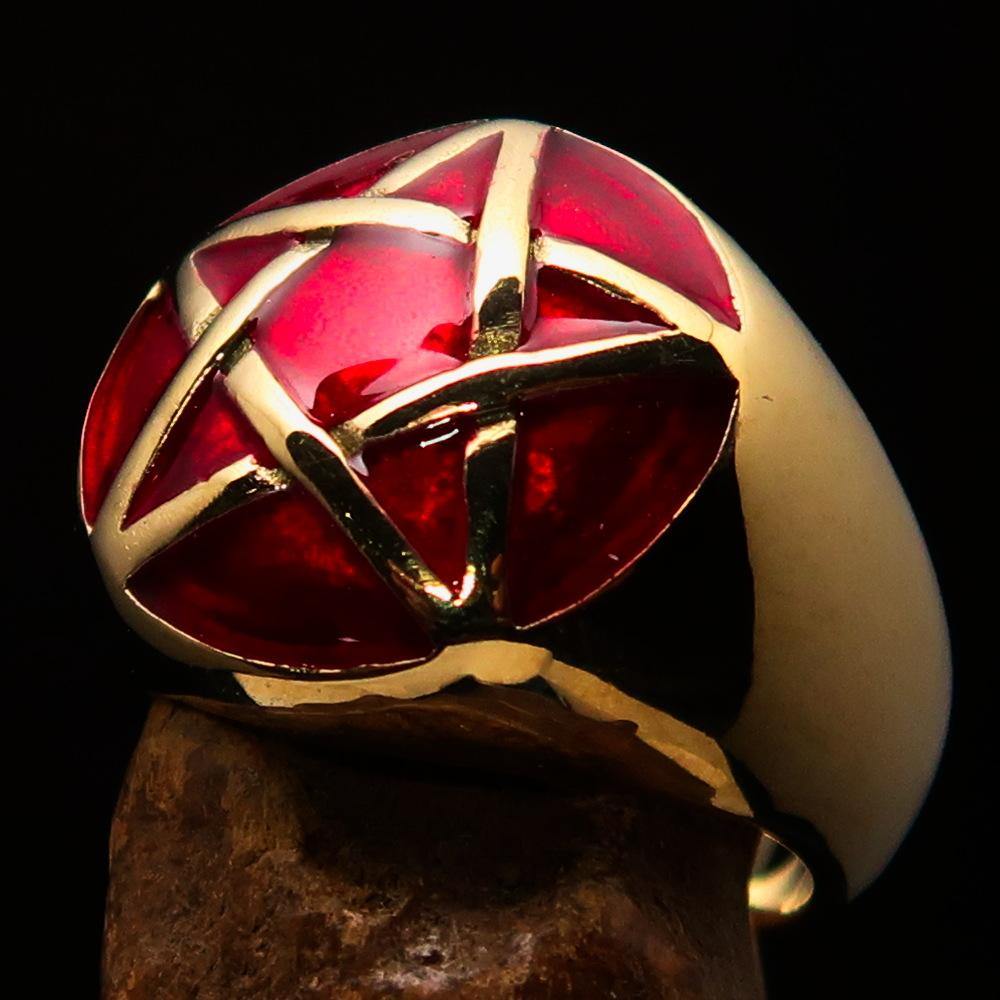 Men's pinky ring made of solid brass featuring a domed red pentagram design, polished finish, and solid back.