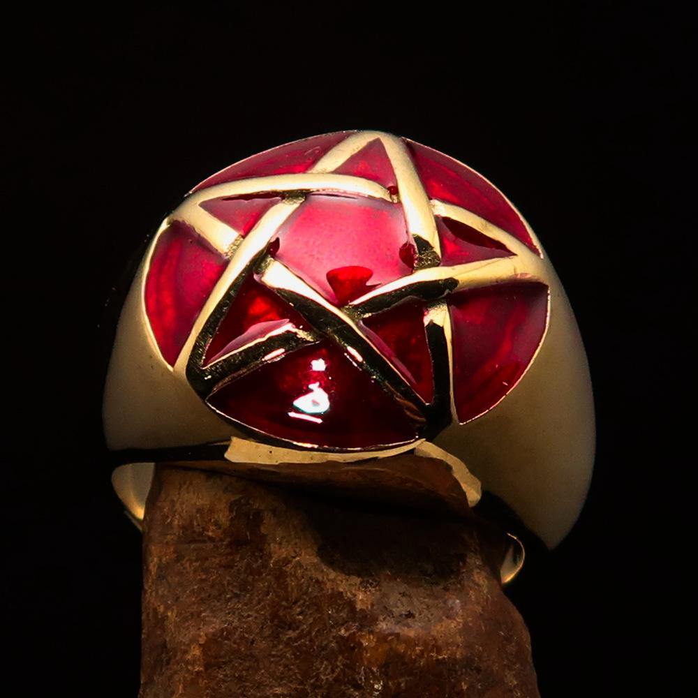 Men's pinky ring made of solid brass featuring a domed red pentagram design, polished finish, and solid back.