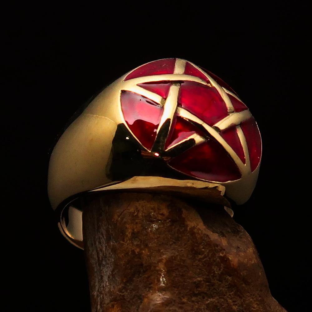 Men's pinky ring made of solid brass featuring a domed red pentagram design, polished finish, and solid back.