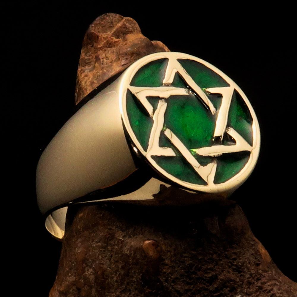 Men's pinky ring made of solid brass featuring a green Star of David, high polished with enamel, showcasing a solid back.