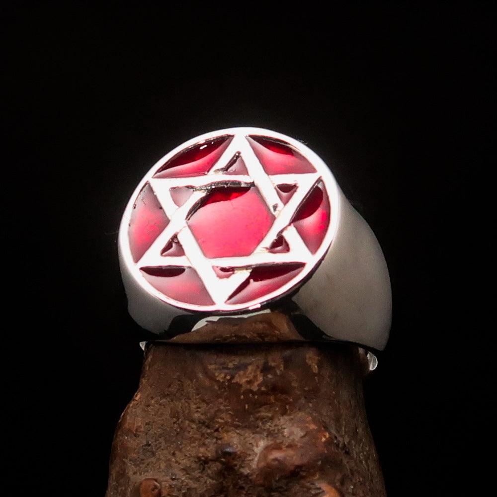 Men's pinky ring made of sterling silver featuring a red Star of David design, polished finish, and solid back.