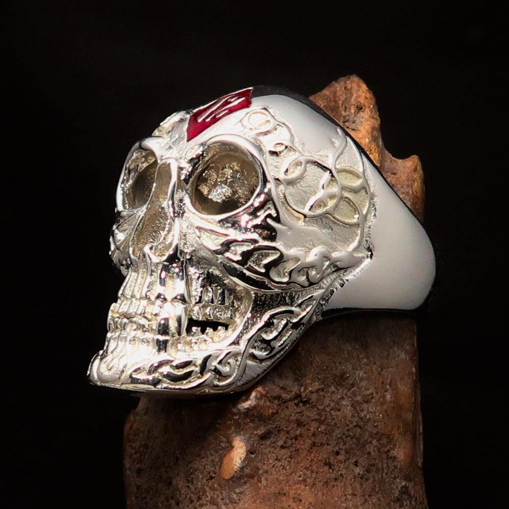 Men's red 1% Runes Skull Outlaw Ring made of solid sterling silver with red enamel detailing, showcasing a polished finish.