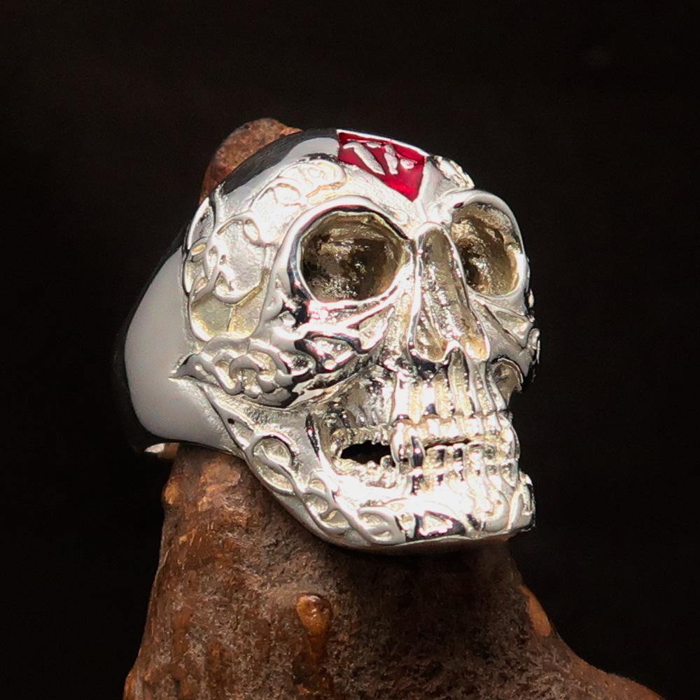 Men's red 1% Runes Skull Outlaw Ring made of solid sterling silver with red enamel detailing, showcasing a polished finish.