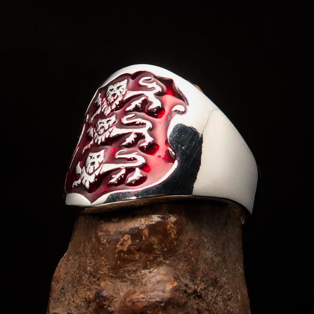 Men's red 3 Lions Coat of Arms Ring in Sterling Silver with bold red enamel design, showcasing craftsmanship and elegance.