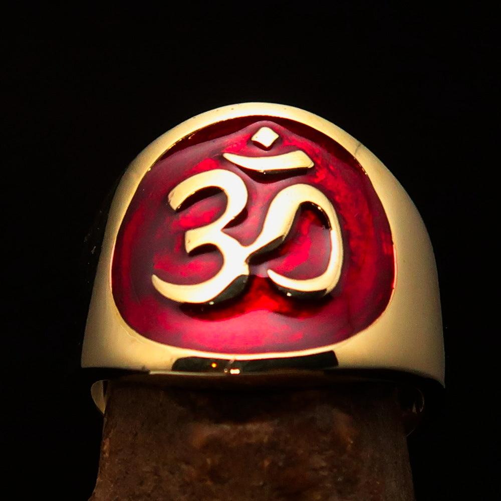 Men's red Aum Buddhist pinky ring made of solid brass with a high-polished enamel finish, showcasing intricate details of the Aum symbol.