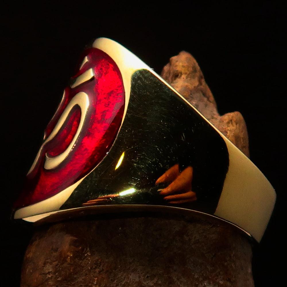 Men's red Aum Buddhist pinky ring made of solid brass with a high-polished enamel finish, showcasing intricate details of the Aum symbol.