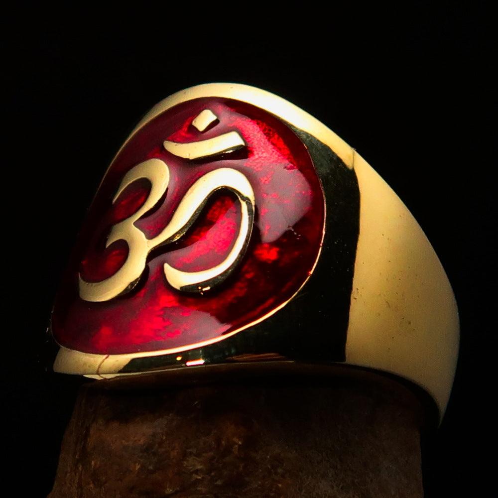 Men's red Aum Buddhist pinky ring made of solid brass with a high-polished enamel finish, showcasing intricate details of the Aum symbol.