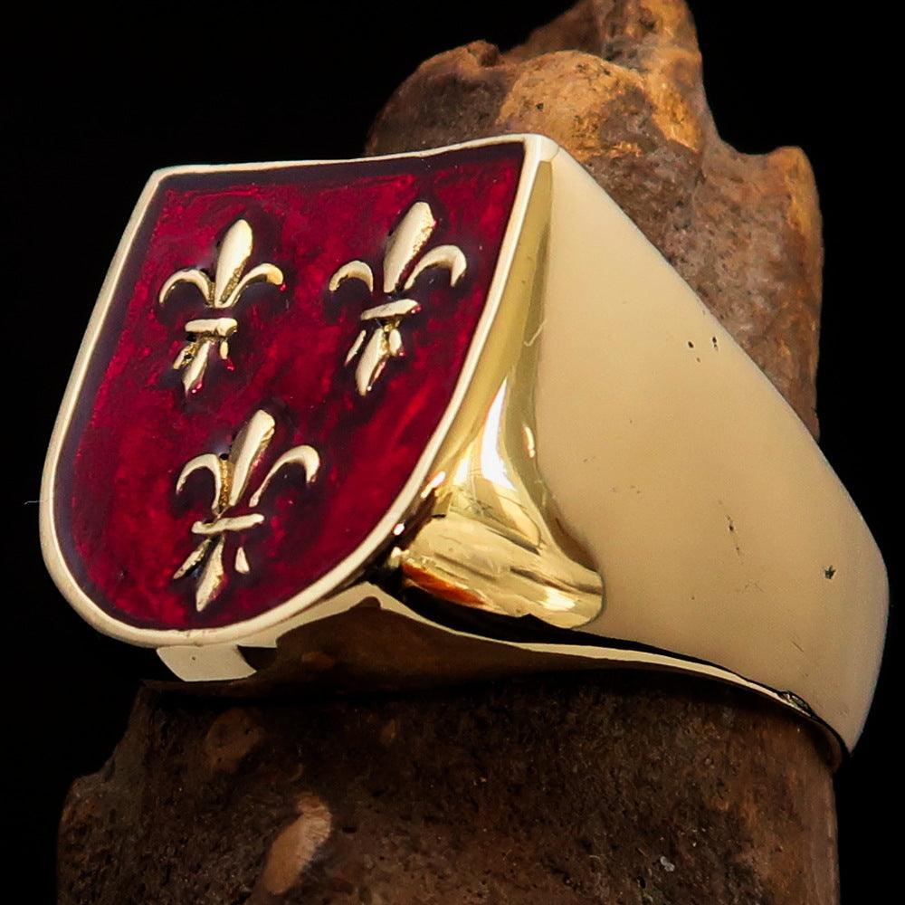 Men's red Fleur de Lis Coat of Arms Ring made of solid brass with high polish and enamel finish, showcasing intricate design.