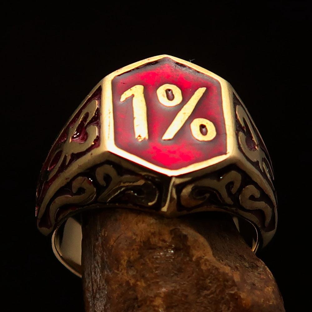 Men's Red Outlaw Biker Ring 1% made of solid brass with high polish and red enamel finish, showcasing its unique design and craftsmanship.